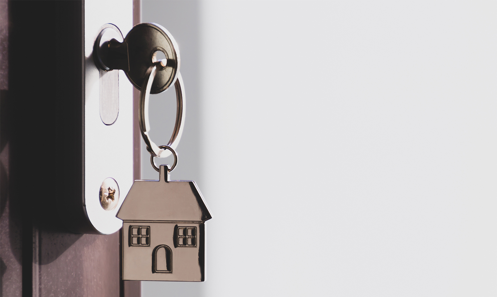 Doorknob with home keychain hanging