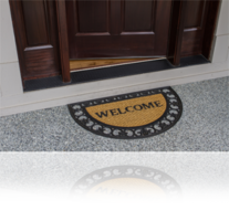 Home's front door opened slightly with a welcome mat