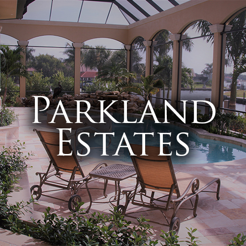 Beautiful indoor pool and garden with lawn chairs